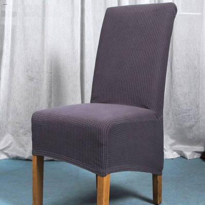 Housse de chaise élastique adaptable aux longs dossiers.